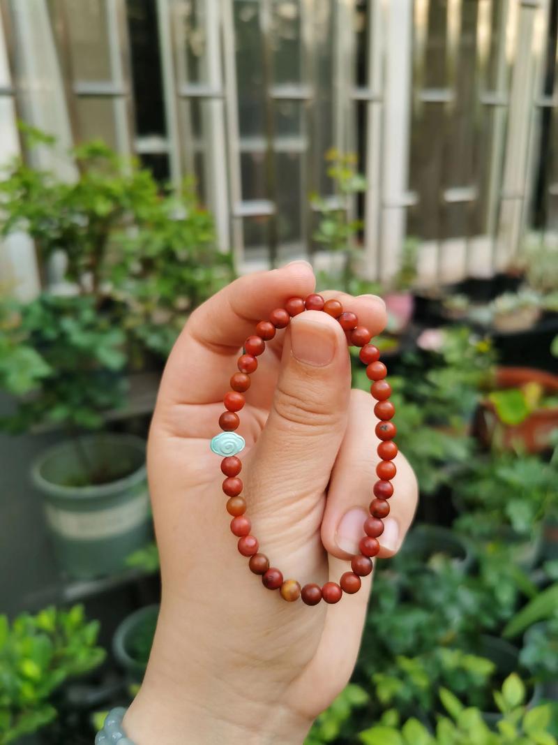 南红盘玩后油润感更强,红得更透更亮(图3) 南红盘玩后油润感更强,红得更透更亮(图3)